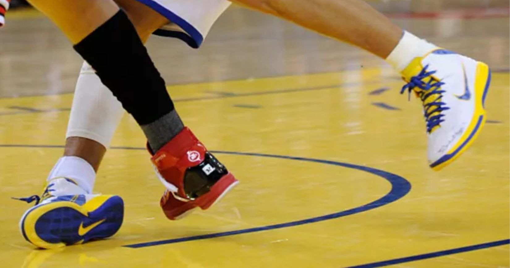 A basketball player spraining their ankle